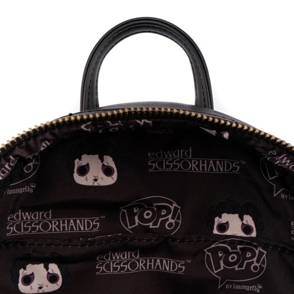 edward scissorhands topiaries mini backpack Loungefly Twentieth Century Studios Sherpa Ba LF Lovers 9W x 10.5H x 4.5D 22.8cm W x 26.6cm H x 11.4cm D This is an officially licensed Twentieth Century Studios product. Scissorhands Salon and Topiary" Backpack